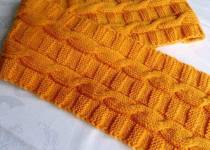 Turuncu iple örülmüş örgü atkı modeli Turuncu iple örülmüş örgü atkı modeli