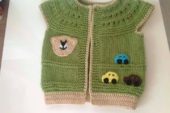 Yeşil krem örgü çocuk yelek modeli
