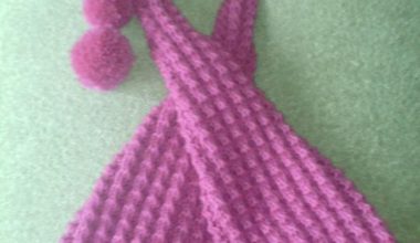 Pembe renkli örgü kukuleta