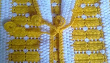 Sarı beyaz örgü bebek yelek modeli