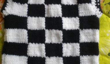 Siyah beyaz iple örülmüş örgü süveter